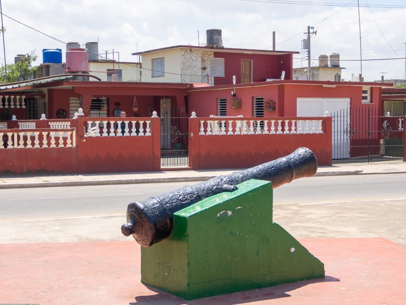 The home of Elián González.  Is the figure behind he wall Elián?