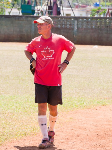 Our friend: Carlos Santos.  Playing baseball wearing a Martin Brodeur t-shirt